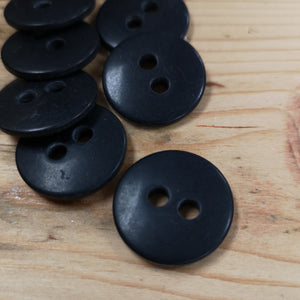 Slim matt black 2-hole button 23 mm