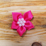 Ribbon flower with pearl centre